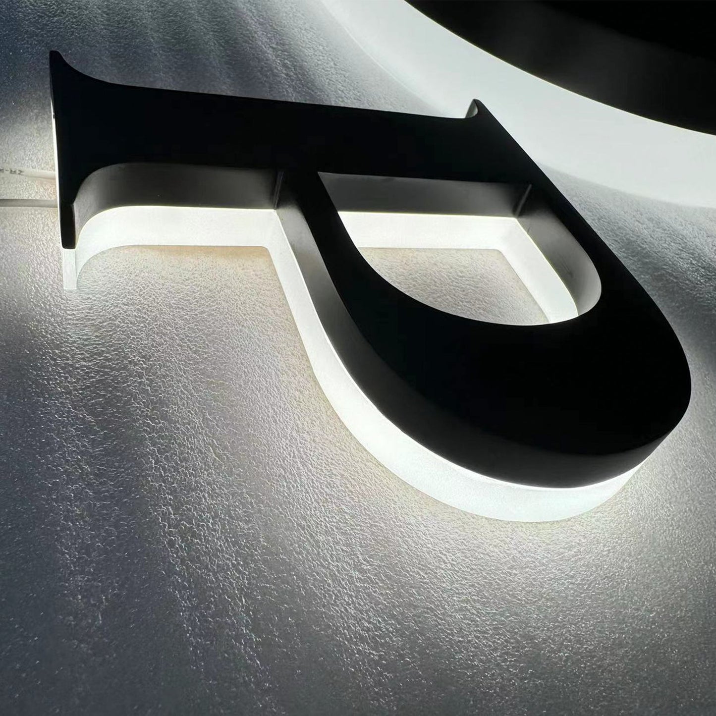 Custom painted stainless steel 3D letters reverse lit channel letters exterior company wall brand signs