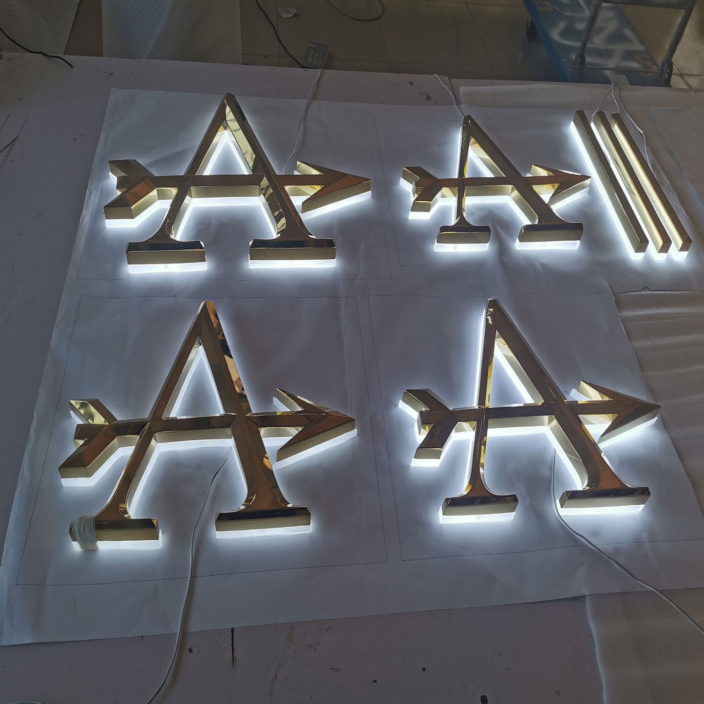 Wholesale factory supplies halo lit acrylic LED letters mirror finish golden stainless steel beveled face letter logo
