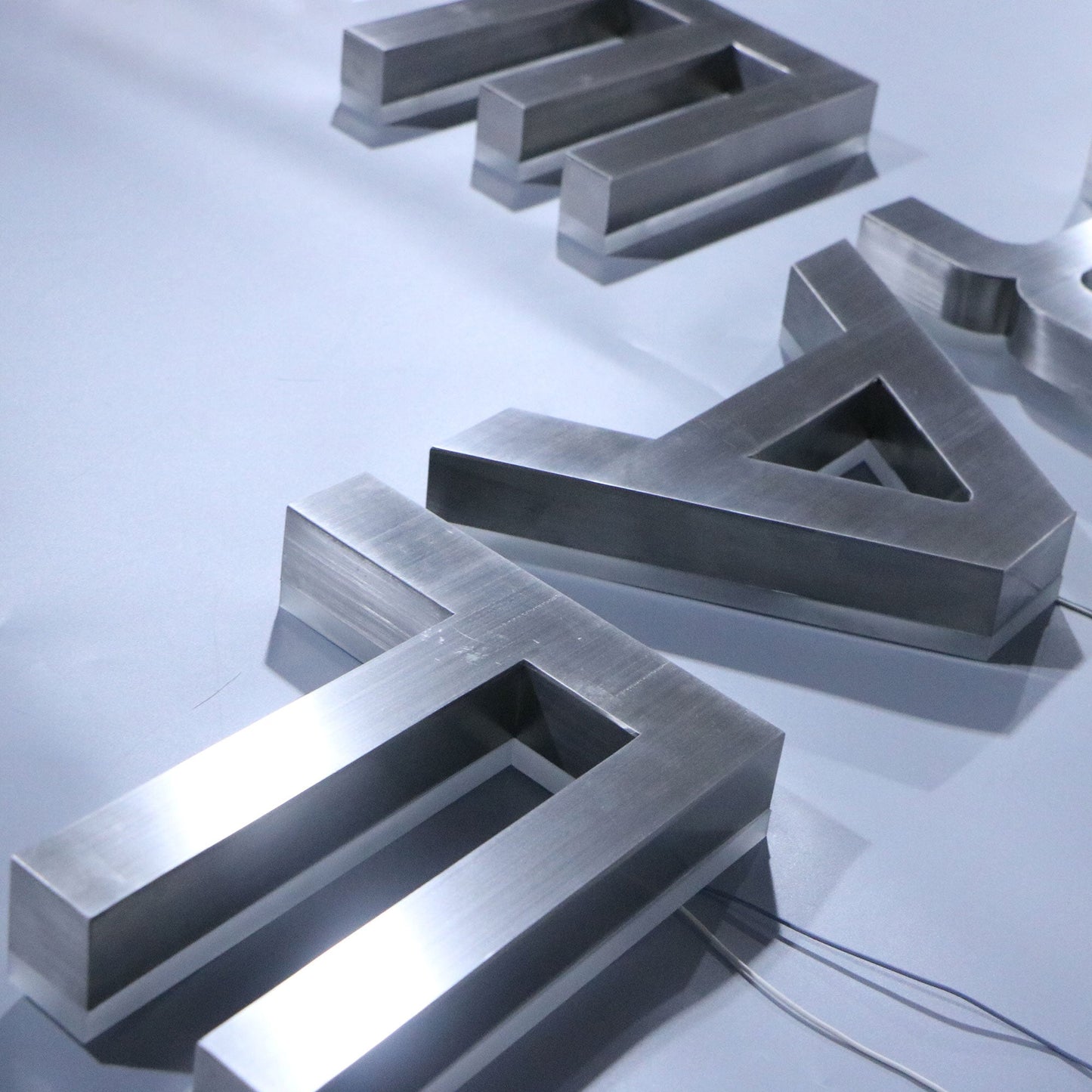 Custom led sign acrylic brushed silver channel letter 3d backlit signage logo reverse lit shopfront sign