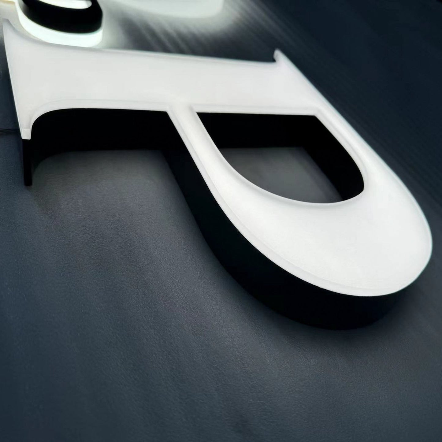 Custom painted stainless steel 3D letters reverse lit channel letters exterior company wall brand signs