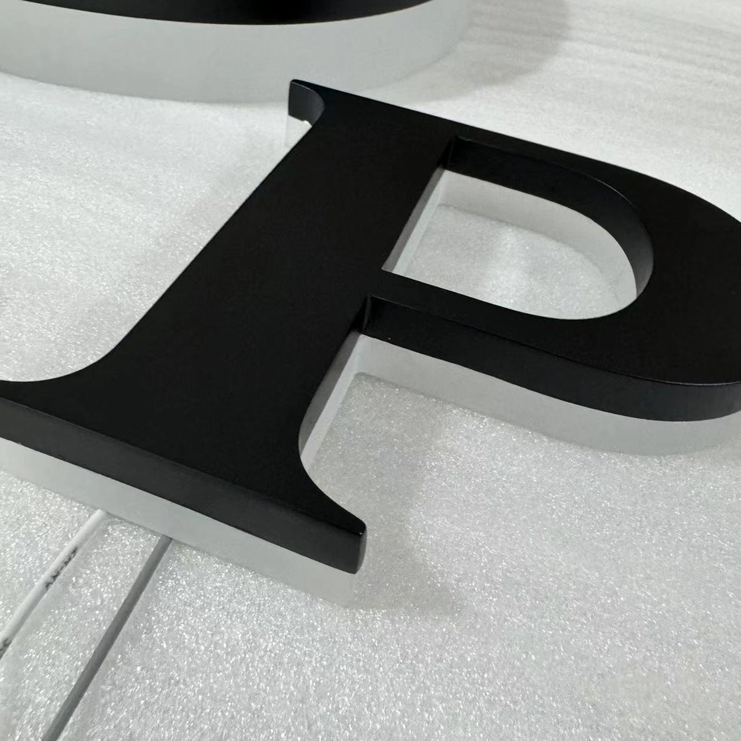 Custom painted stainless steel 3D letters reverse lit channel letters exterior company wall brand signs